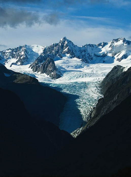 The terminal face and the Waiho River below the ice
